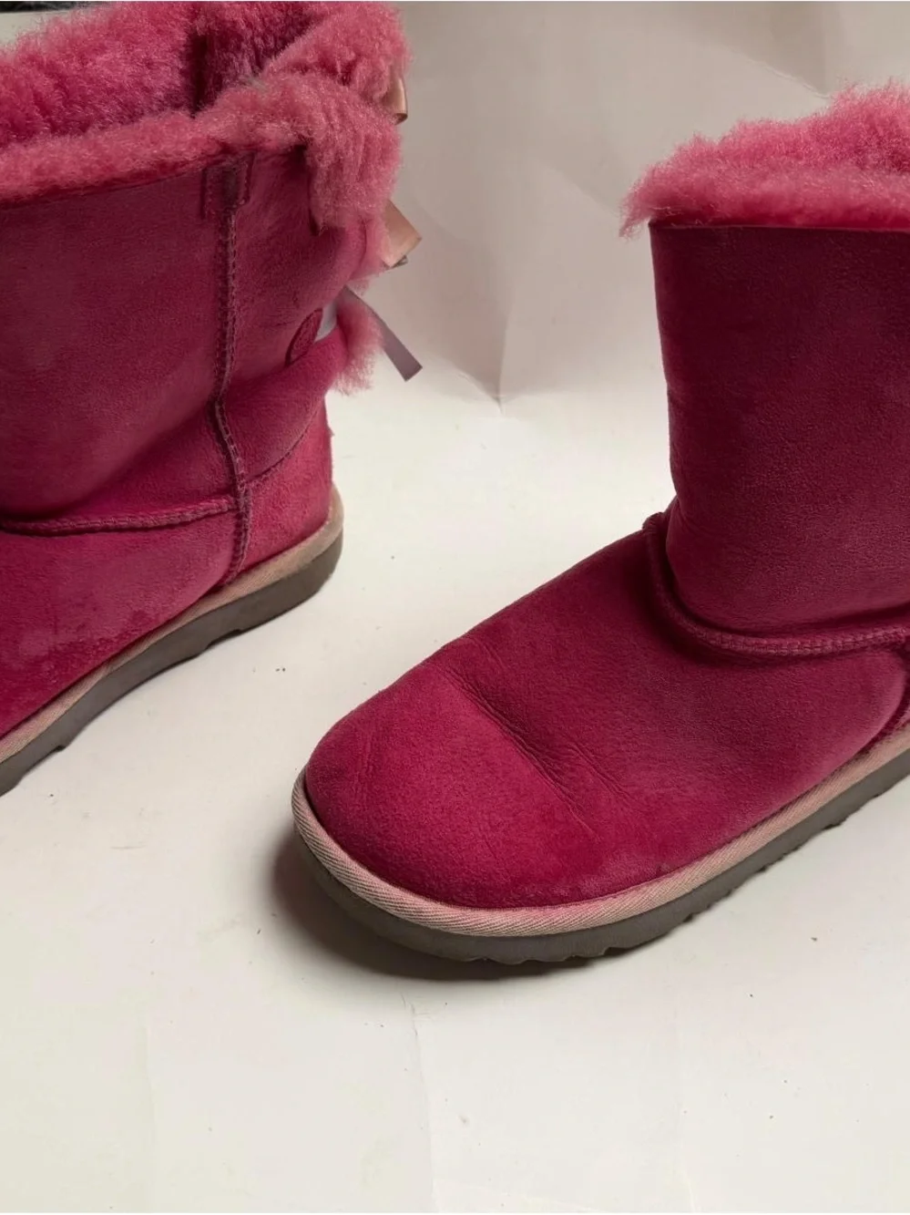 UGG Kids Fuchsia Suede Shearling Boots. They are a bit dirty on the back.